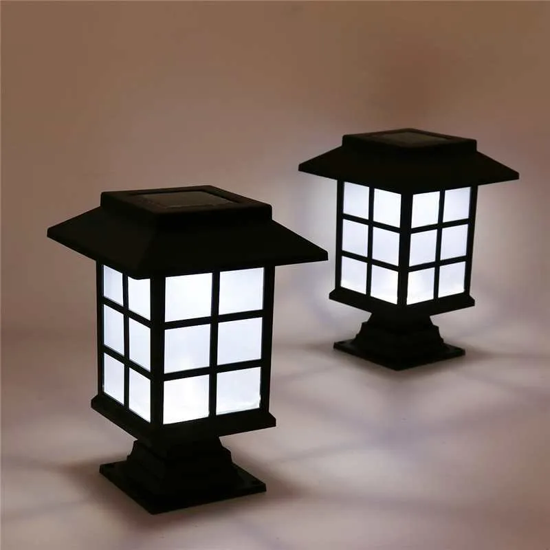 Black solar-powered LED lawn light for outdoor garden and pathway illumination.