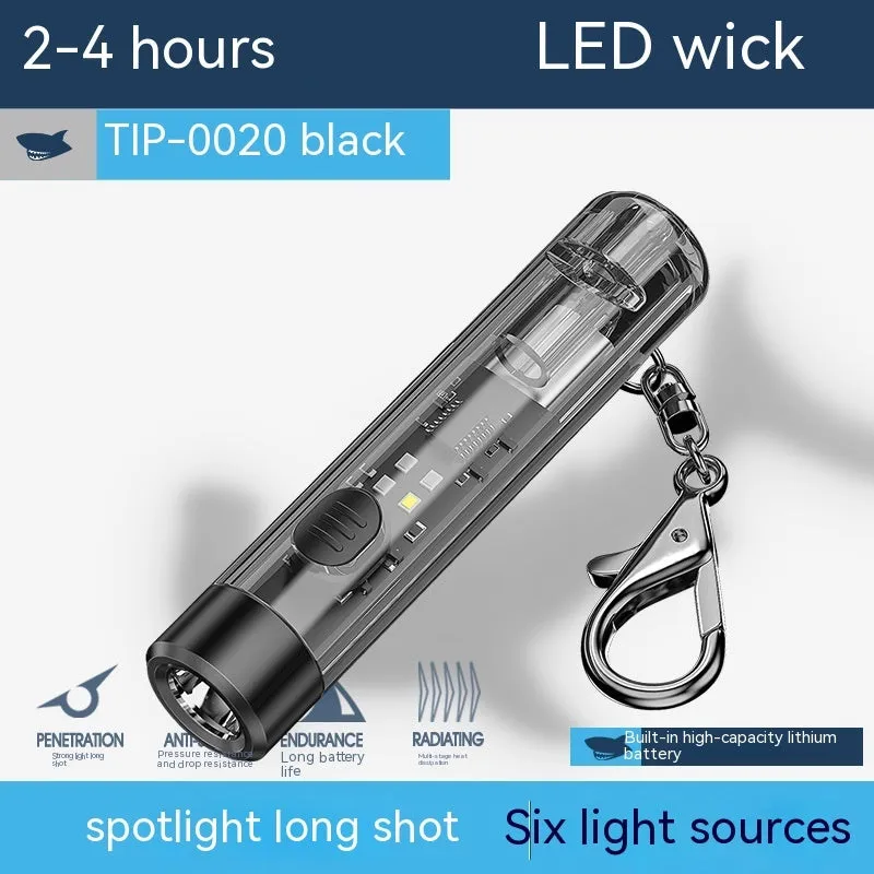 Black plastic portable flashlight with USB charging port.