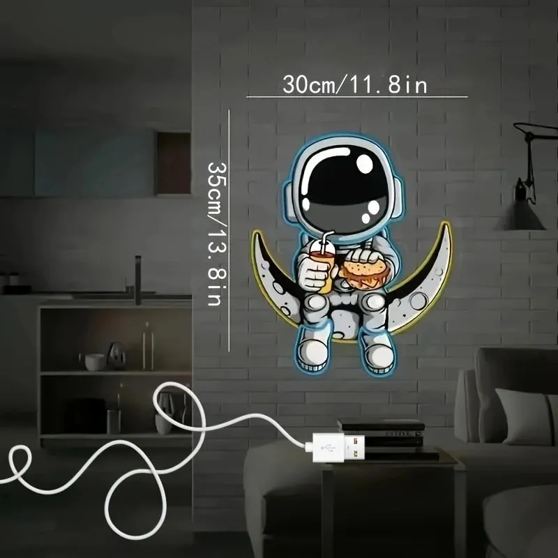Astronaut-shaped wall-mounted neon light with USB power cord in blue or white colour options