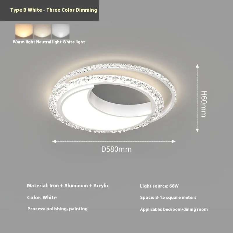 Modern round iron ceiling lamp in black finish mounted on a white ceiling.