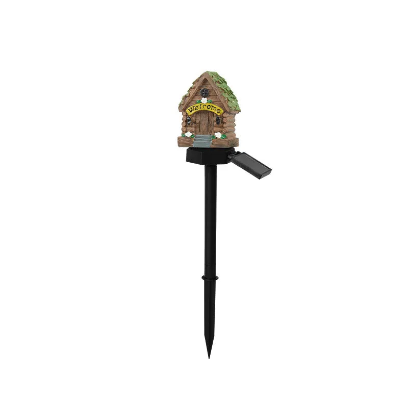 Solar-powered outdoor LED landscape light with flower-shaped resin house design and IP55 waterproof rating