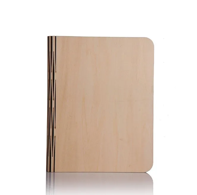 Solid wood USB-powered book light in three size options on a wooden table.