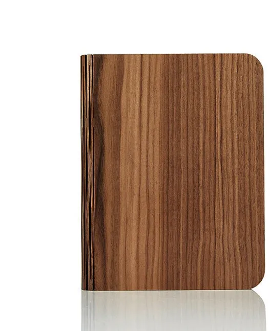 Solid wood USB-powered book light in three size options on a wooden table.