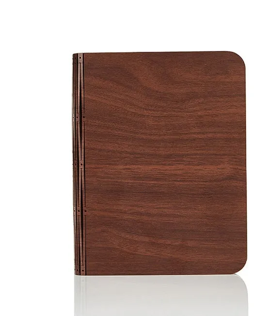 Solid wood USB-powered book light in three size options on a wooden table.