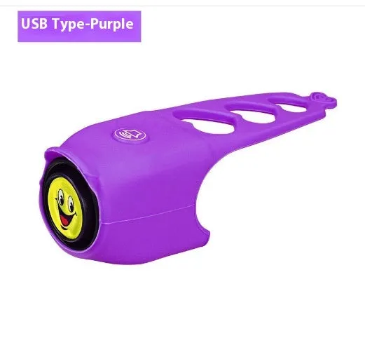 A plastic bicycle electronic horn in a choice of colours, showing handlebar mounting and two button cell batteries.