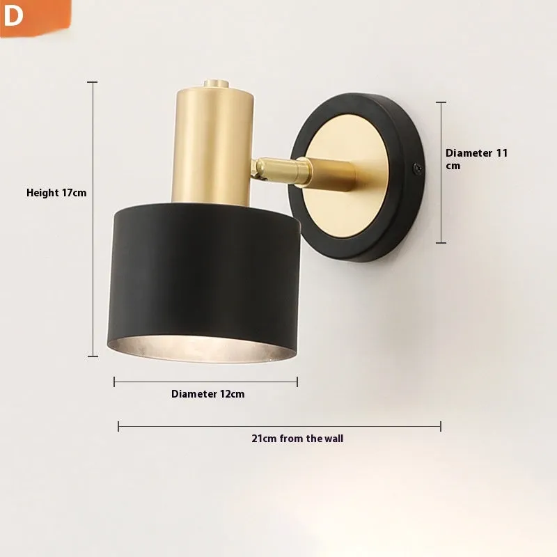 Nordic style iron wall lamp mounted on a wall, showcasing its welded shade design.