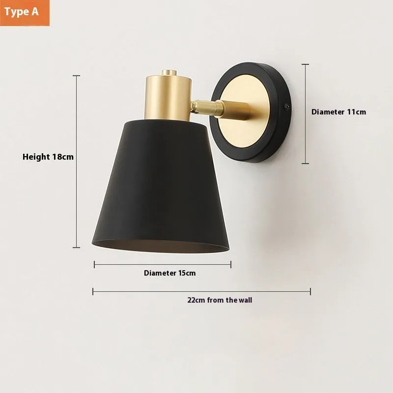 Nordic style iron wall lamp mounted on a wall, showcasing its welded shade design.