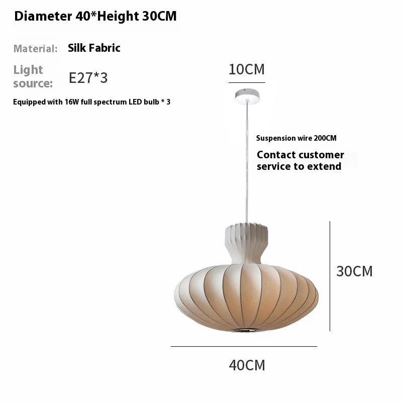 A vintage-style Chinese chandelier with a silk shade and variable three-colour LED light.