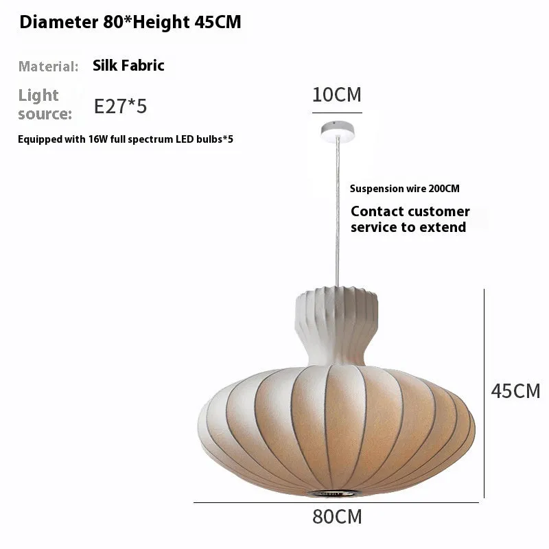 A vintage-style Chinese chandelier with a silk shade and variable three-colour LED light.