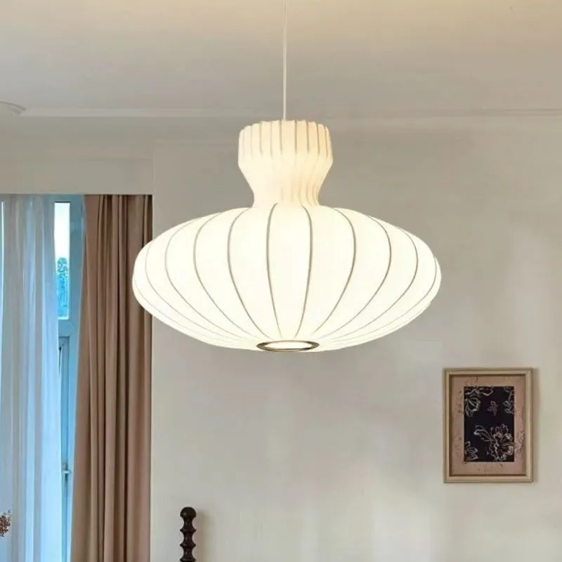 A vintage-style Chinese chandelier with a silk shade and variable three-colour LED light.