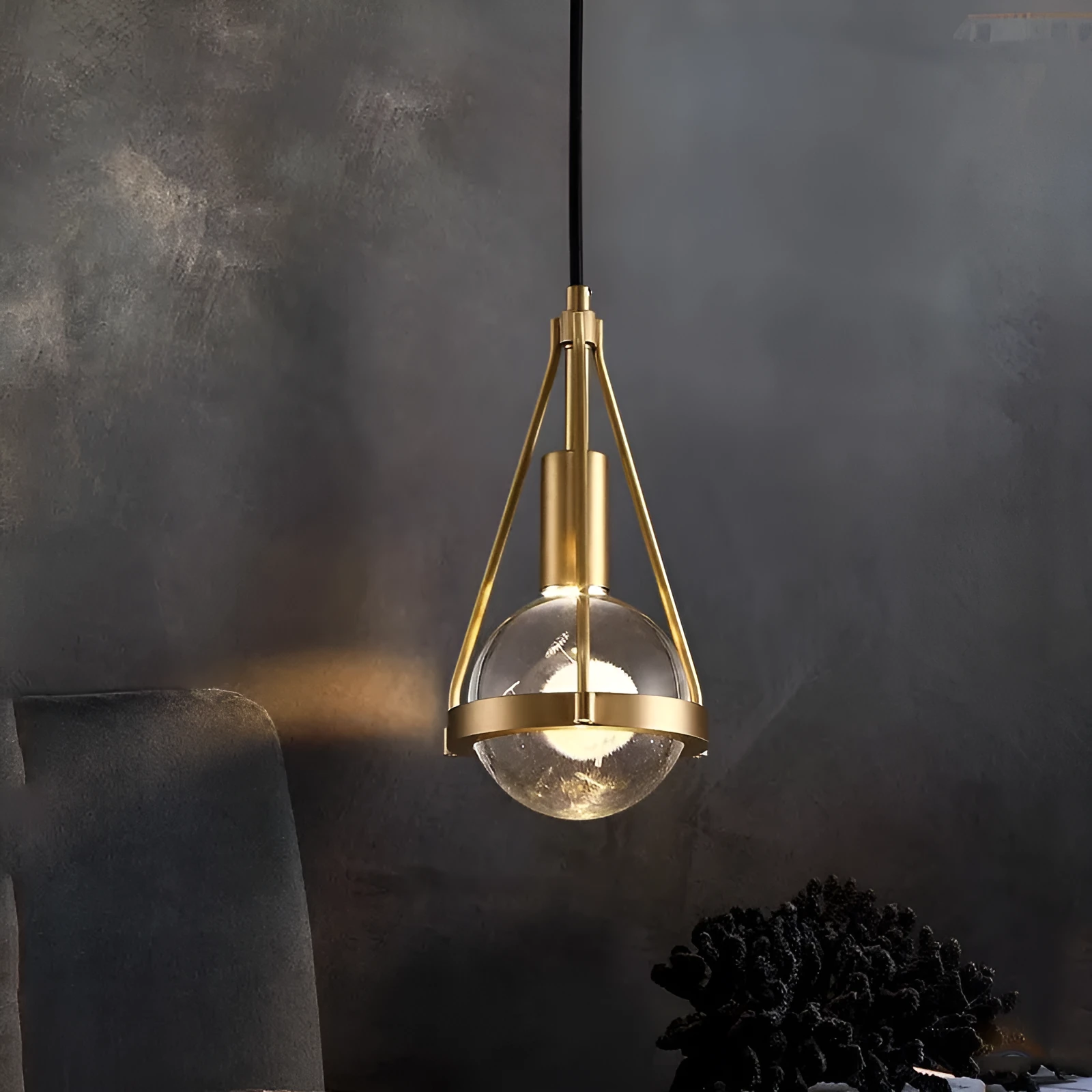 Modern copper and crystal chandelier with multiple light heads in a minimalist design.