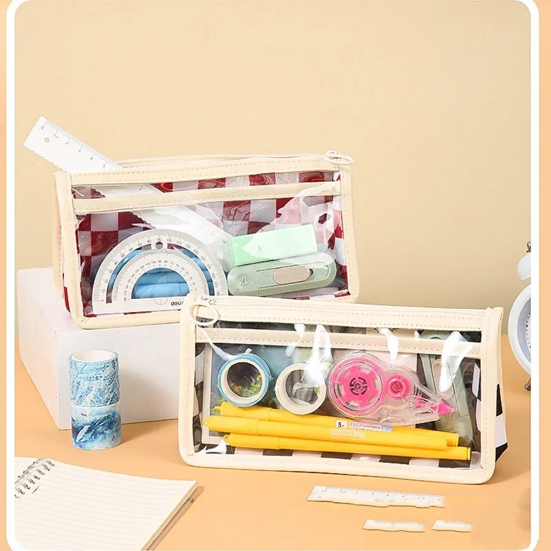 Large transparent PVC pencil case with chessboard grid pattern in black and white plaid.