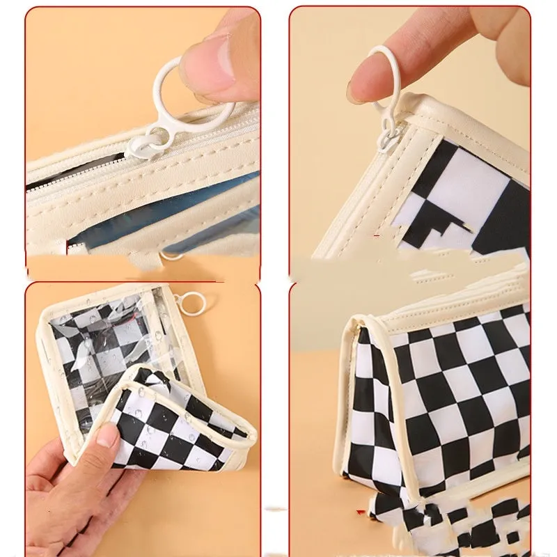 Large transparent PVC pencil case with chessboard grid pattern in black and white plaid.