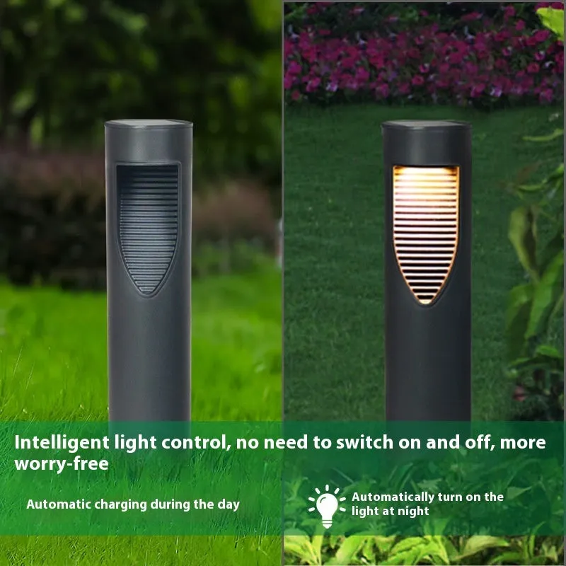 Black geometric solar-powered outdoor garden light with abstract design.