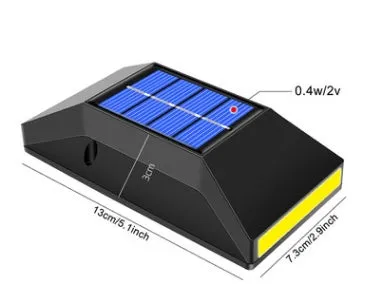 Compact rectangular solar-powered LED wall light for outdoor staircase and pathway illumination