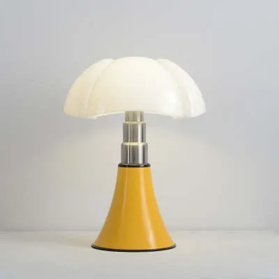 Italian retro style flower table lamp on a bedside table in a choice of colours.