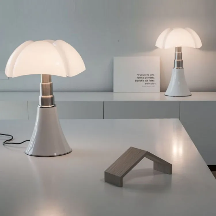 Italian retro style flower table lamp on a bedside table in a choice of colours.