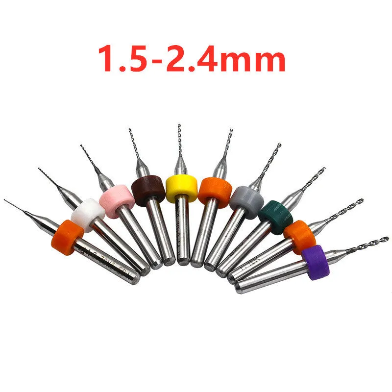 Ten tungsten carbide PCB drill bits with straight shanks on a white background