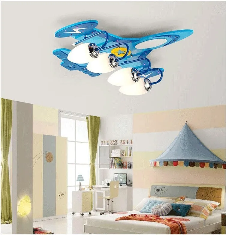 Cartoon aeroplane design children's ceiling light with wood frame and rectangular glass shade.