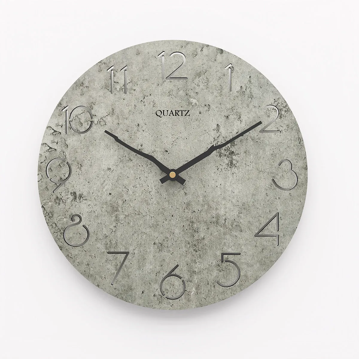 Modern grey European-style wall clock with a round face on a white wall.
