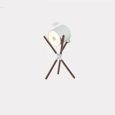Modern wooden three-fork LED floor lamp with white acrylic shade in a living room setting.