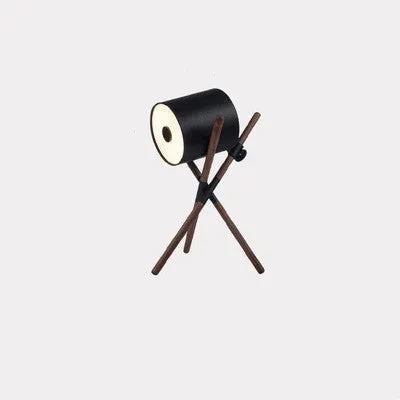 Modern wooden three-fork LED floor lamp with white acrylic shade in a living room setting.