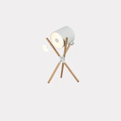 Modern wooden three-fork LED floor lamp with white acrylic shade in a living room setting.