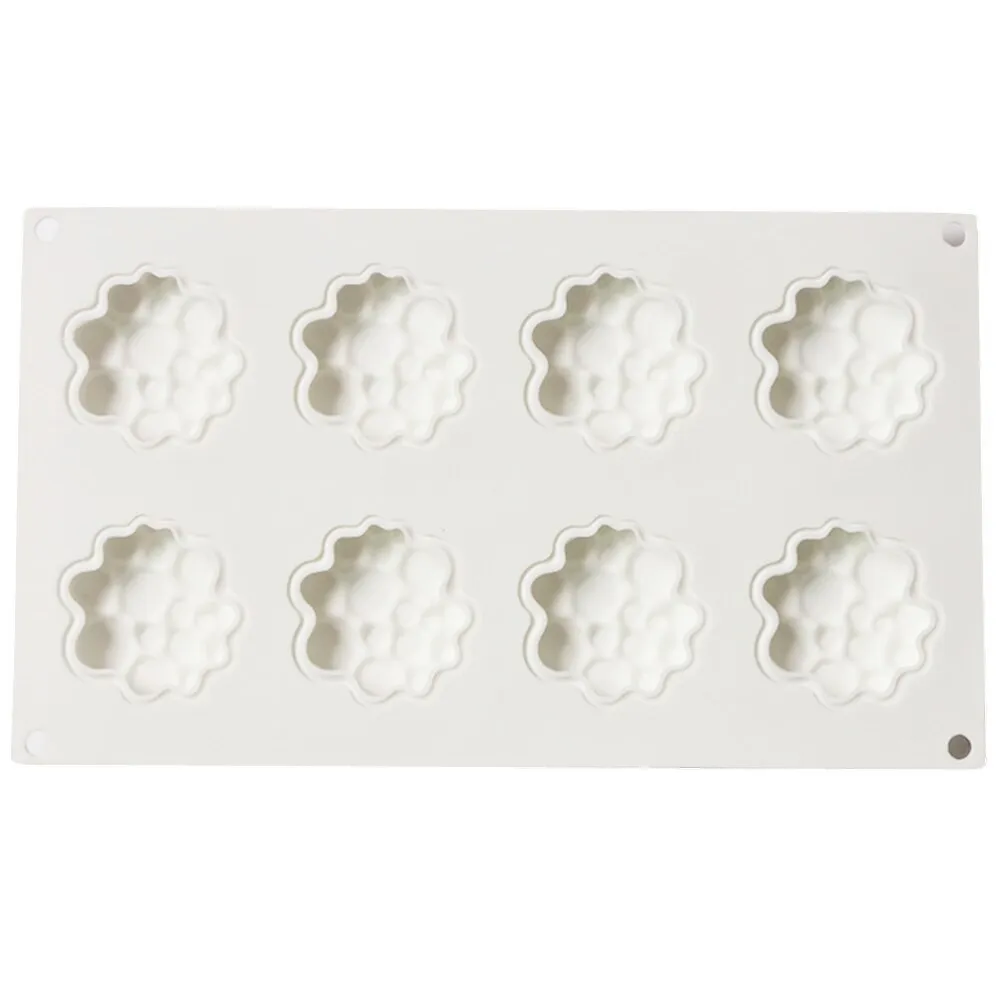 Round silicone baking mould with eight bubble indentations for cakes and desserts