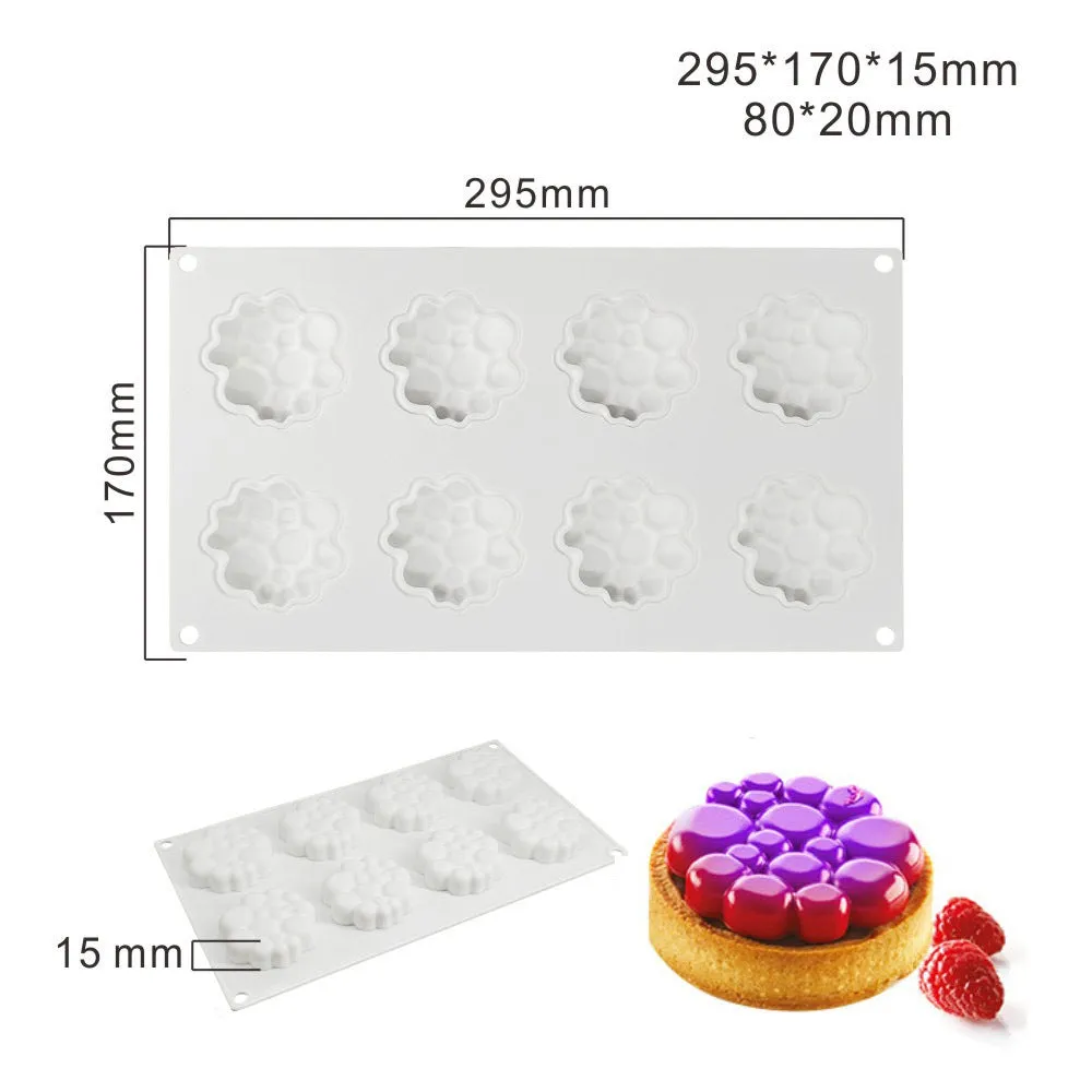 Round silicone baking mould with eight bubble indentations for cakes and desserts