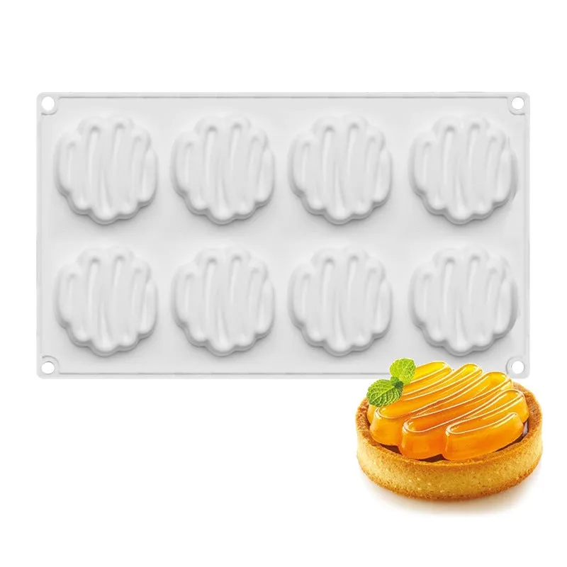Round silicone baking mould with eight bubble indentations for cakes and desserts