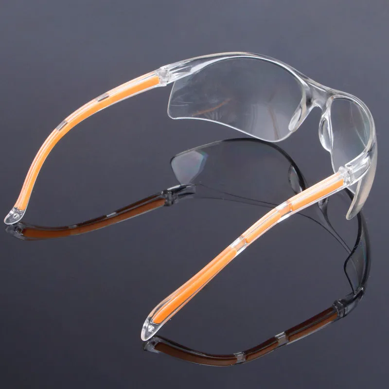 Transparent safety goggles with yellow frame made from impact-resistant polycarbonate