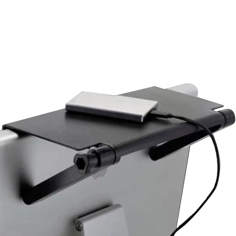 Plastic hook-mount rack holding a set-top box and router on a desktop.