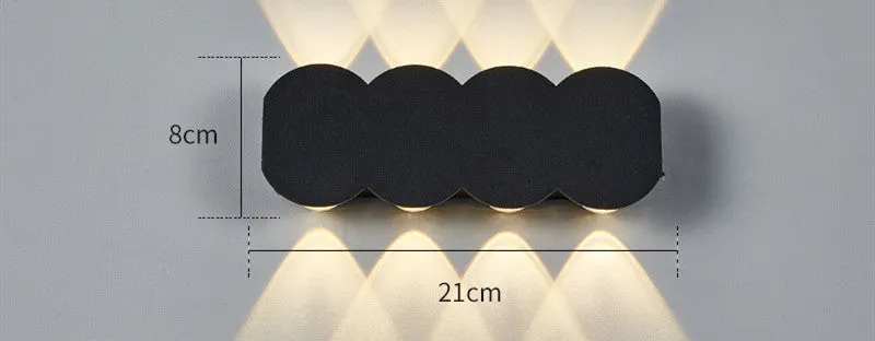 Modern minimalist waterproof LED wall light with clean design for indoor or outdoor installation