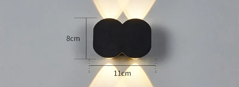 Modern minimalist waterproof LED wall light with clean design for indoor or outdoor installation