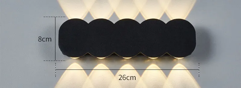 Modern minimalist waterproof LED wall light with clean design for indoor or outdoor installation