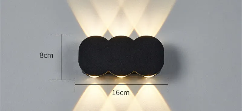 Modern minimalist waterproof LED wall light with clean design for indoor or outdoor installation