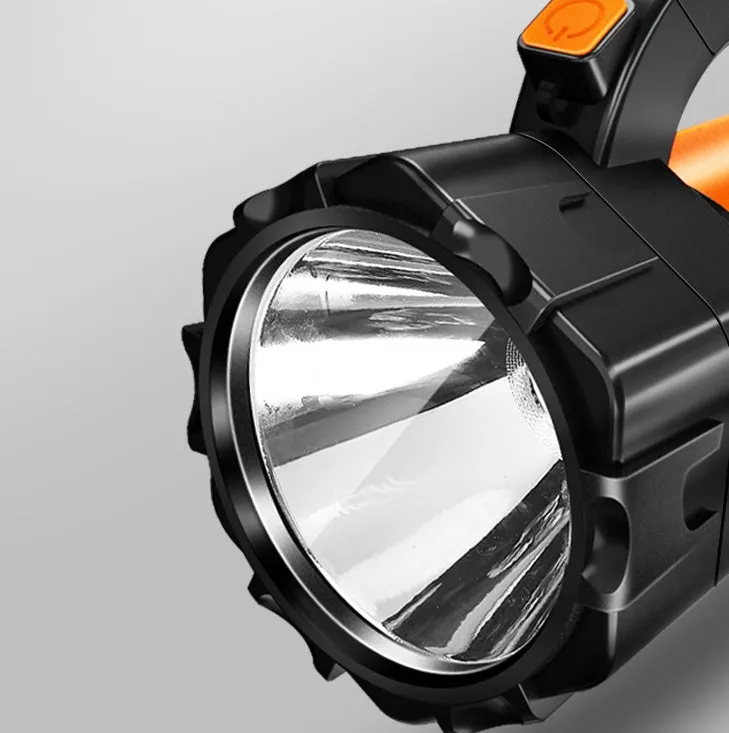 H771 portable orange or green camping lamp with removable battery and shoulder strap.