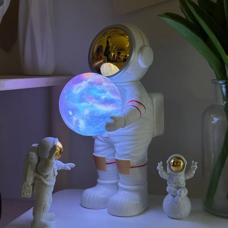 Spaceman Starry Sky Projection Lamp showing star projection effect and Bluetooth speaker