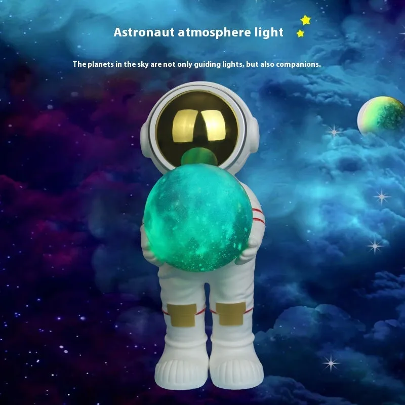 Spaceman Starry Sky Projection Lamp showing star projection effect and Bluetooth speaker