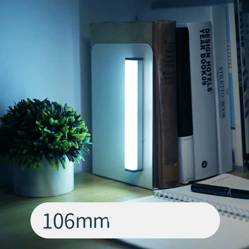 Hand-scanning rechargeable LED strip light for cabinets with magnetic and adhesive backing.
