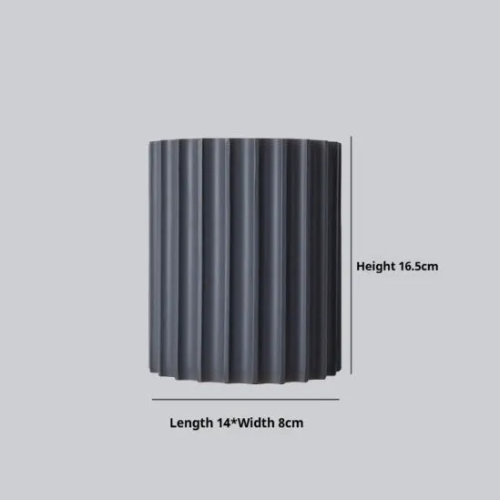 Nordic style wall light with a white macaron shell-shaped shade mounted on a hallway wall.