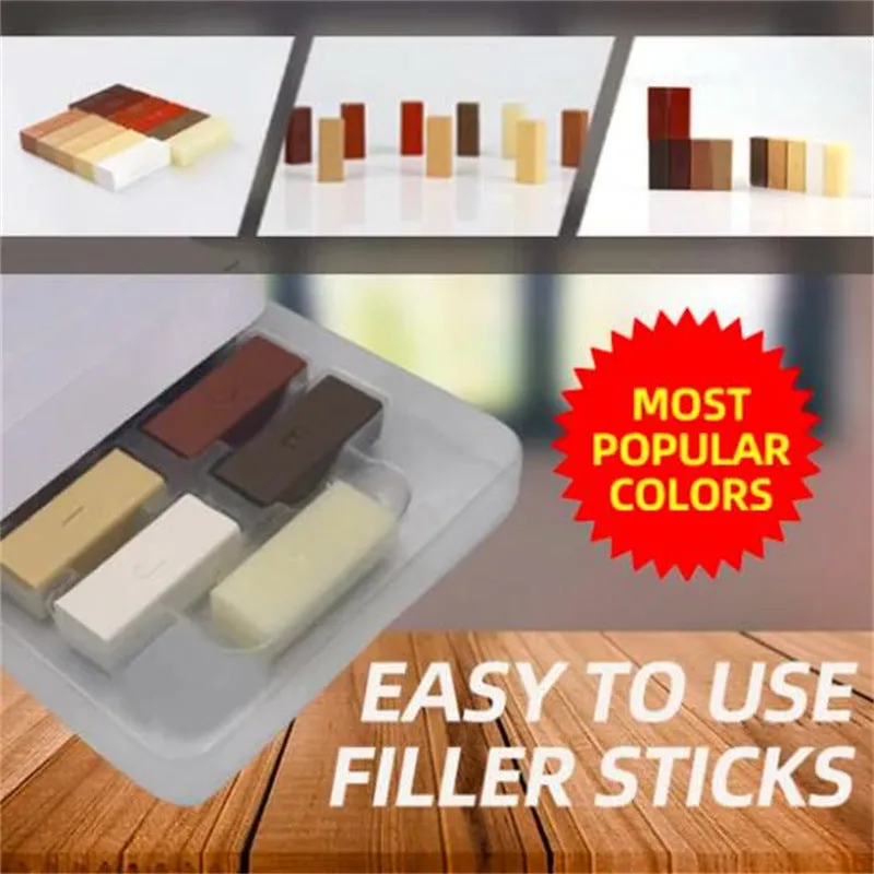 DIY floor and furniture repair kit with red handle and coloured wax sticks on a tile surface.
