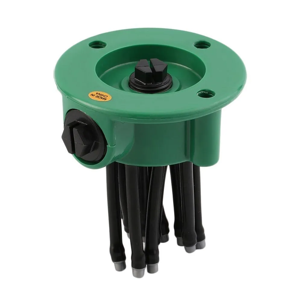 Green adjustable lawn sprinkler with bendable nozzles on 9 cm circular base