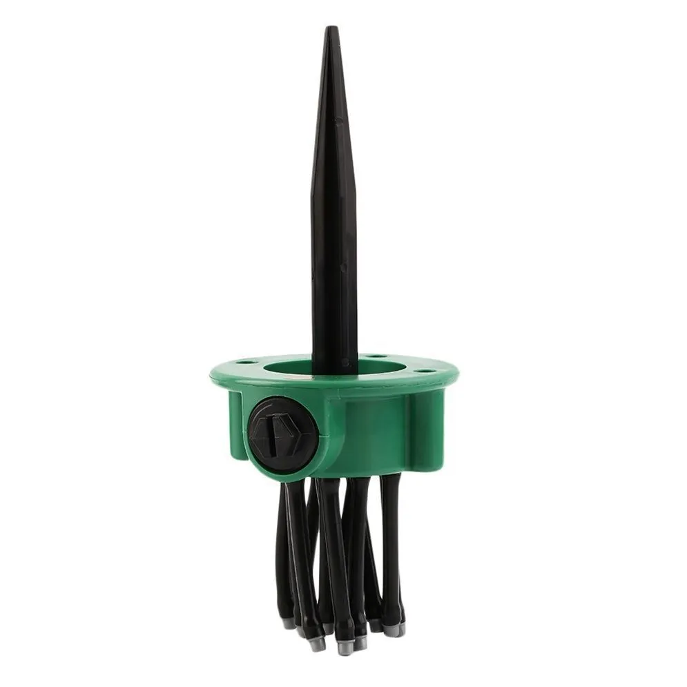 Green adjustable lawn sprinkler with bendable nozzles on 9 cm circular base
