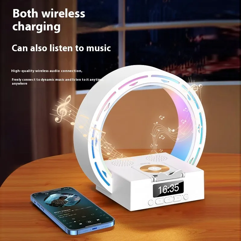 White multifunctional Bluetooth speaker with wireless charging pad, bedside lamp and digital clock display on wooden table