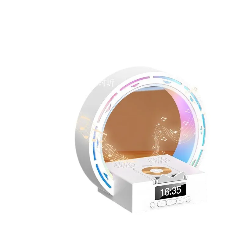 White multifunctional Bluetooth speaker with wireless charging pad, bedside lamp and digital clock display on wooden table