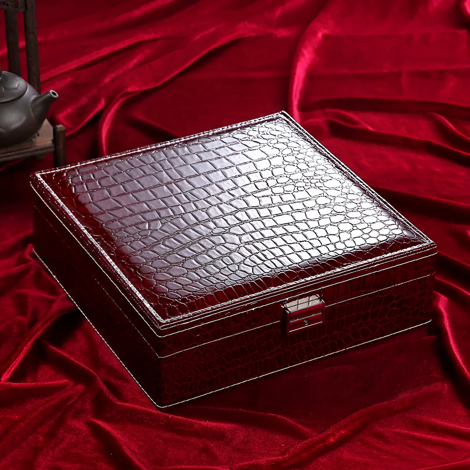 Green crocodile pattern leather double layer wooden jewellery box with lock open, showing storage compartments.