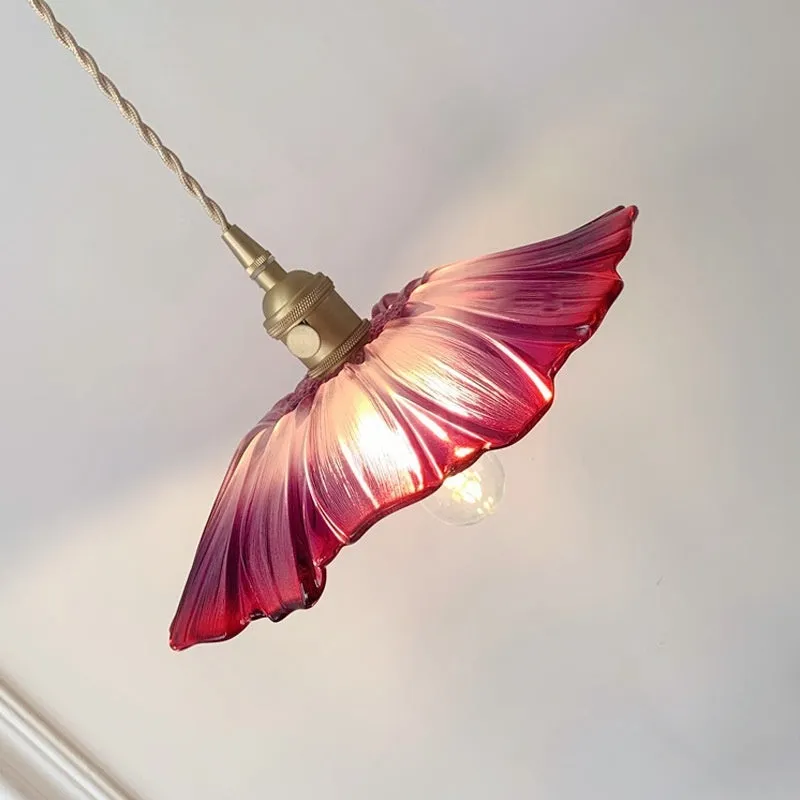 Nordic Japanese style lotus leaf shaped ceiling or pendant lamp with iron frame and glass shade.