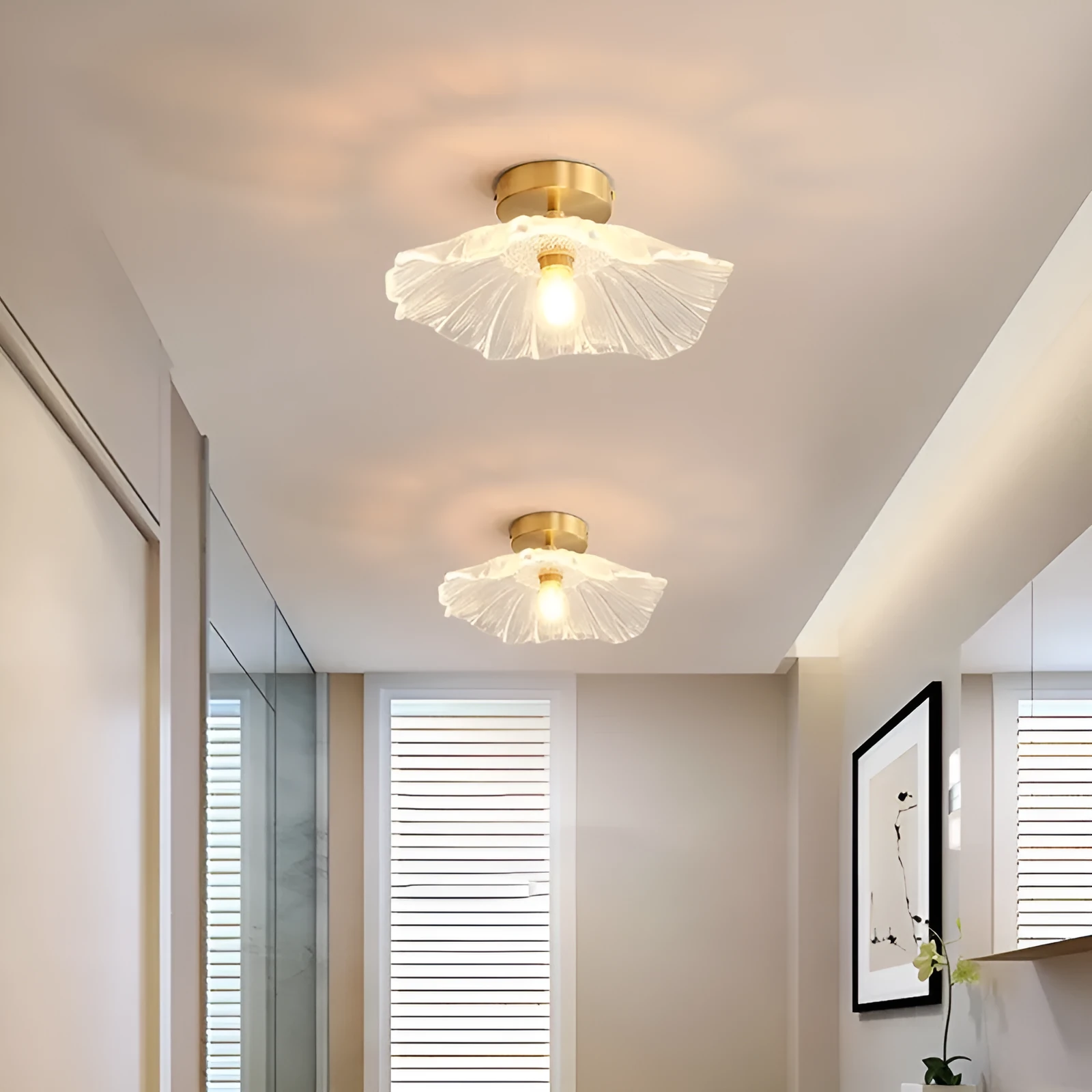 Nordic Japanese style lotus leaf shaped ceiling or pendant lamp with iron frame and glass shade.