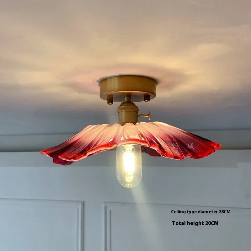 Nordic Japanese style lotus leaf shaped ceiling or pendant lamp with iron frame and glass shade.
